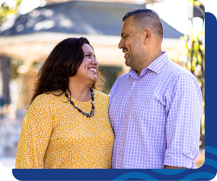 Smiling partners outdoors, focusing on managing type 2 diabetes and weight management